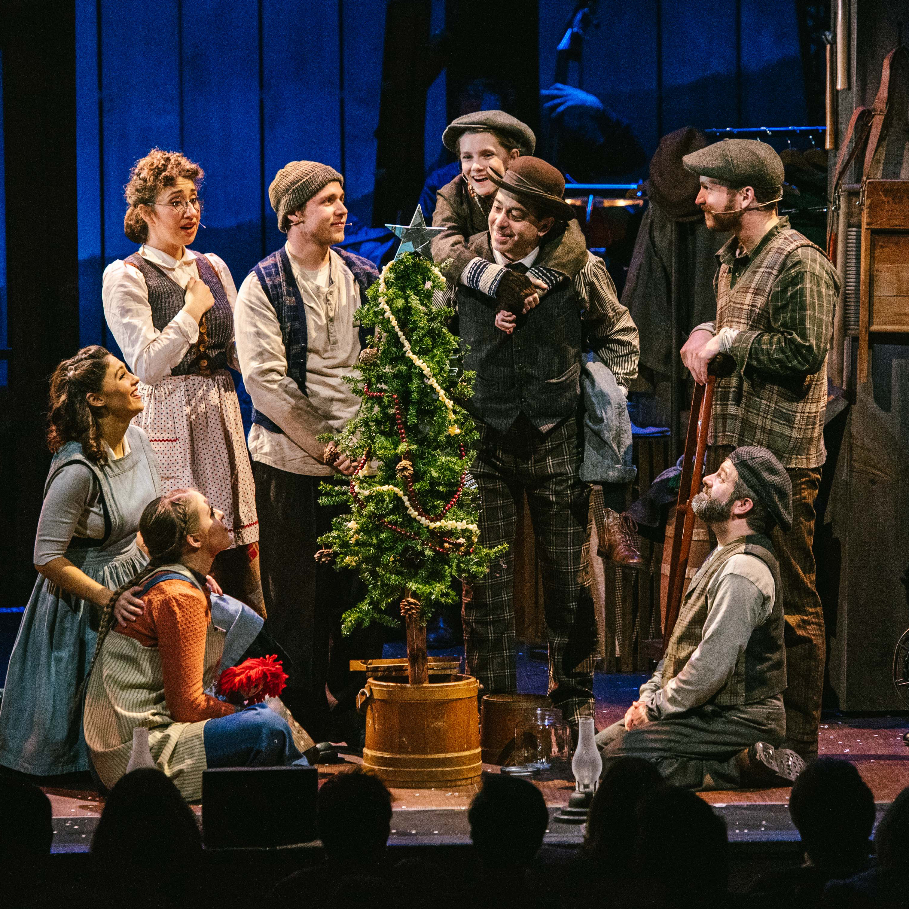 cast of actors on stage